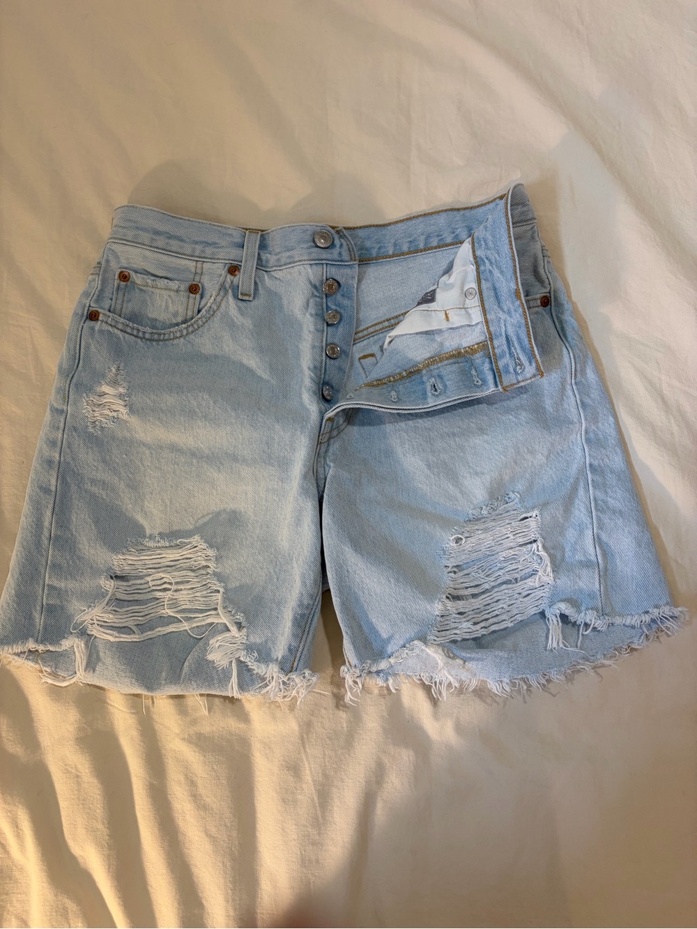 Levi’s 501 Light Blue Distressed Denim Shorts for Women